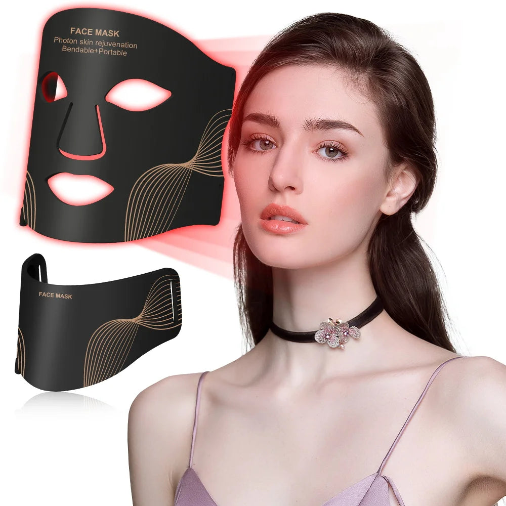 A woman wearing a black choker stands beside the LumiLift™ Red Light Therapy Silicone Face Mask, which glows red as it offers bendable, portable photon skin rejuvenation and effective red light therapy for revitalized skin.